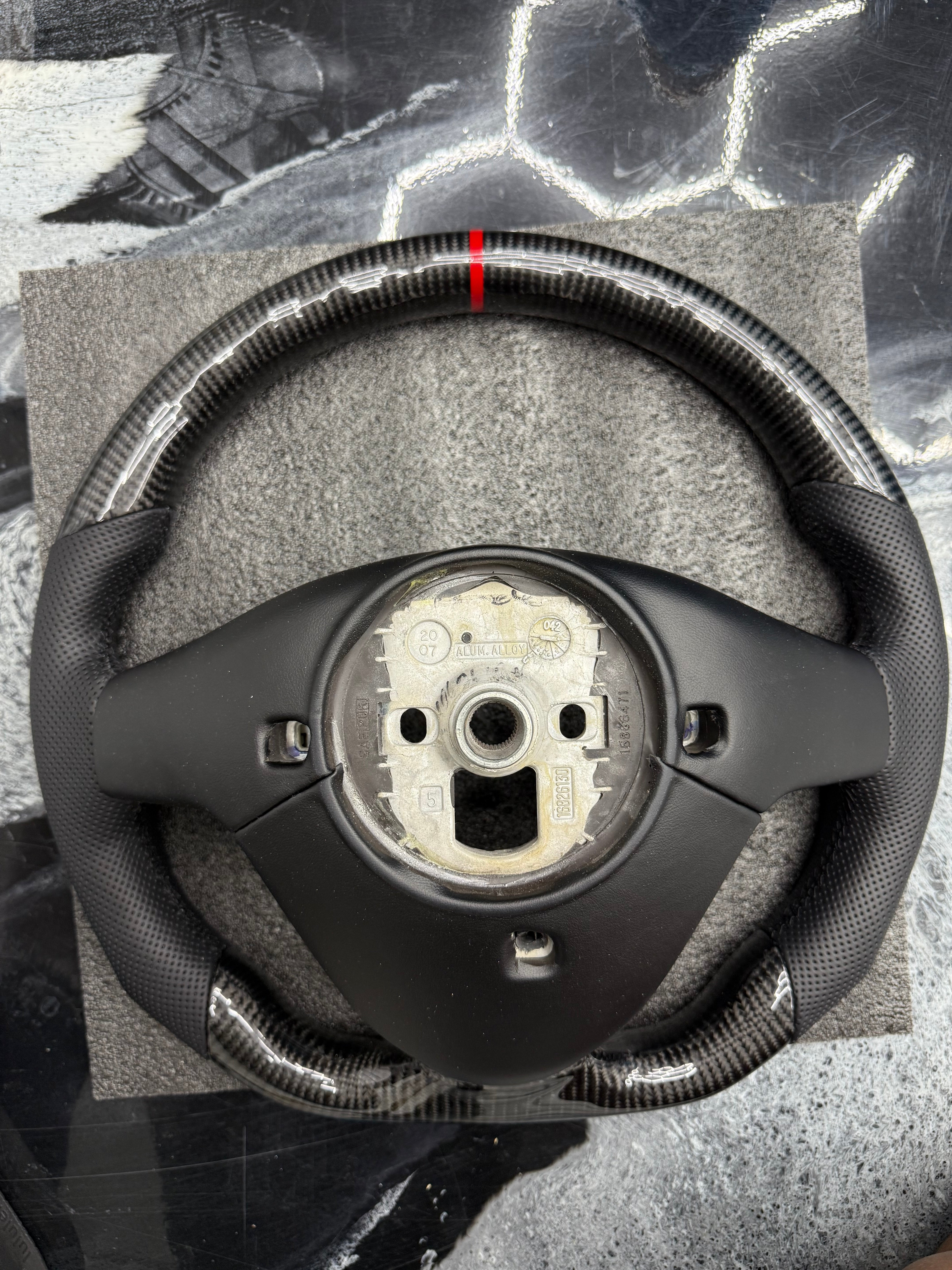 2003 - 2008 CTS, CTS-V V1 Custom Carbon Fiber Steering Wheel with Perforated Leather Hand Grips / Leather Rear Cover